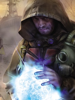 Сталкер с энергетическим артефактом в руках обои