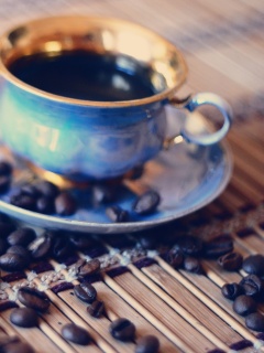 Чашка кофе и немного зерен обои