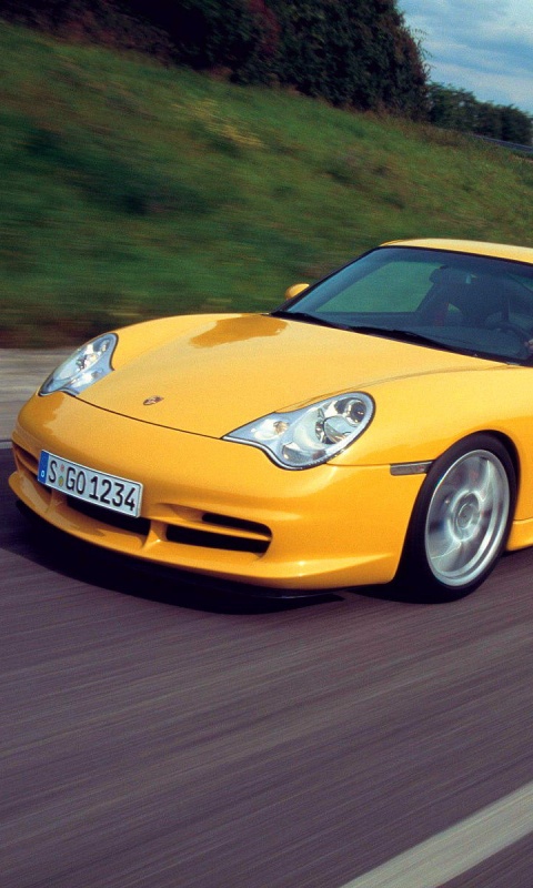 Желтый порш на повороте обои