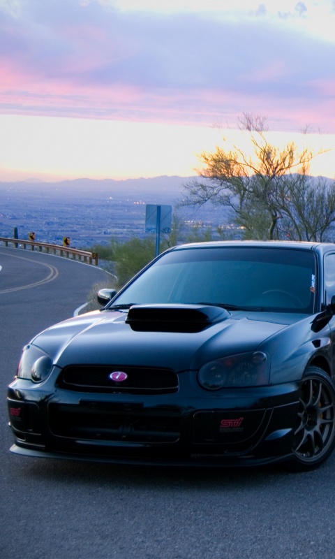 Субару на смотровой алощадке в горах обои