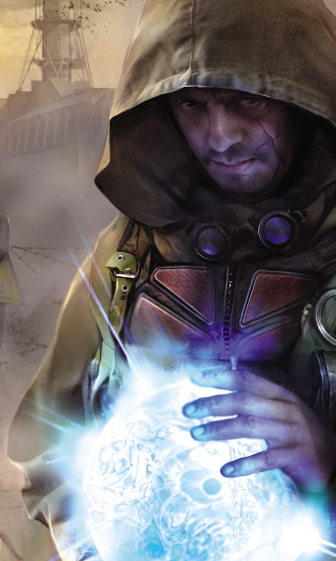 Сталкер с энергетическим артефактом в руках обои