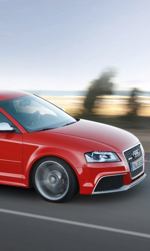 Красная Audi модели RS3 на дороге обои
