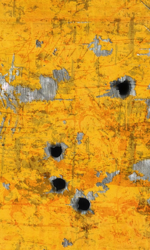 Пулевые отверстия в желтом листе обои