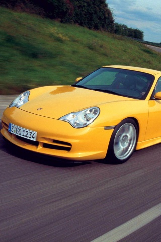 Желтый порш на повороте обои