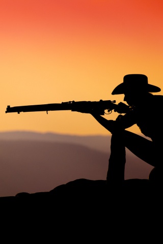Стрелок на закате обои