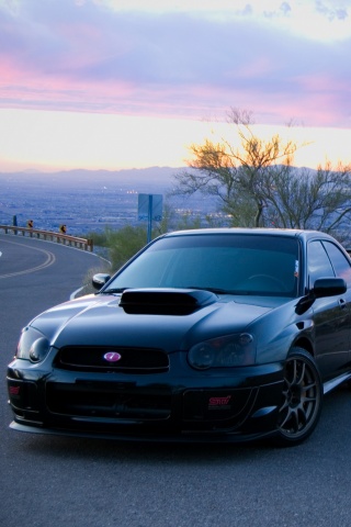 Субару на смотровой алощадке в горах обои