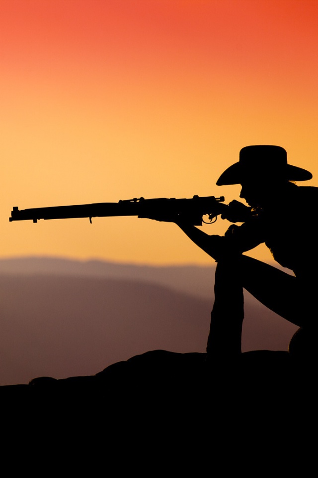 Стрелок на закате обои