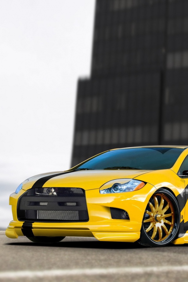 Mitsubishi жёлтого цвета с черными полосами обои