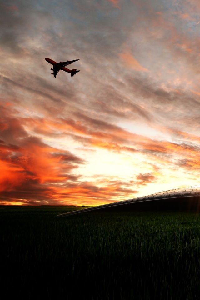 Самолет в закатном небе обои