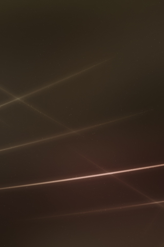 Лучи света на бронзовом фоне обои