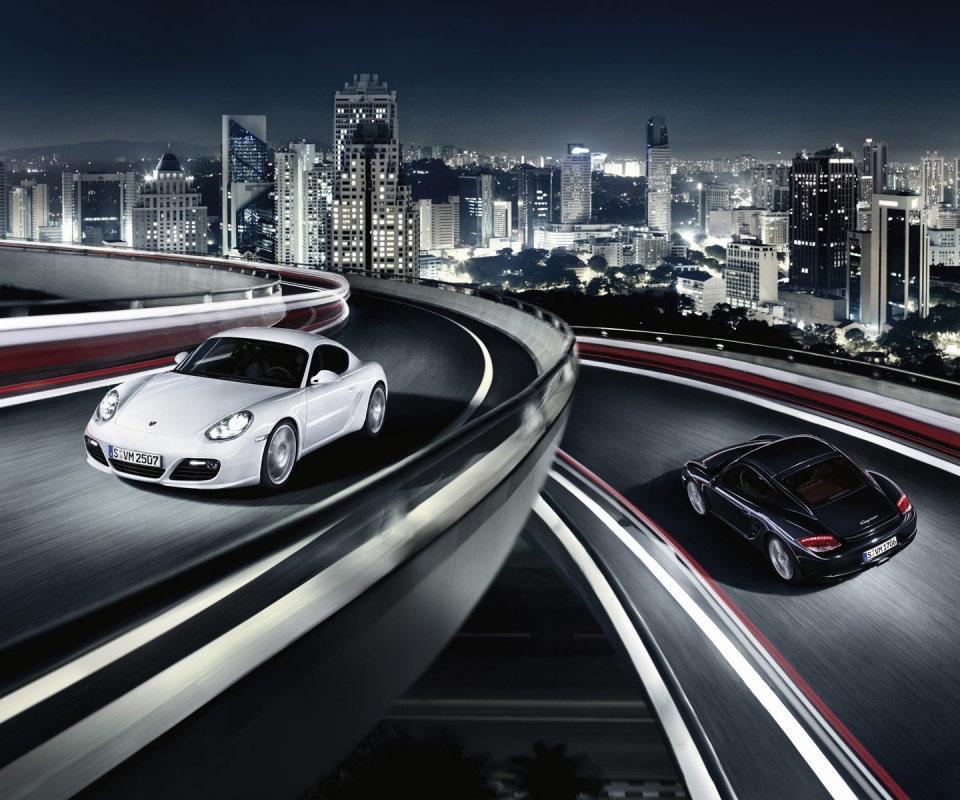 Черный и белый Porsche на автомагистрале. обои