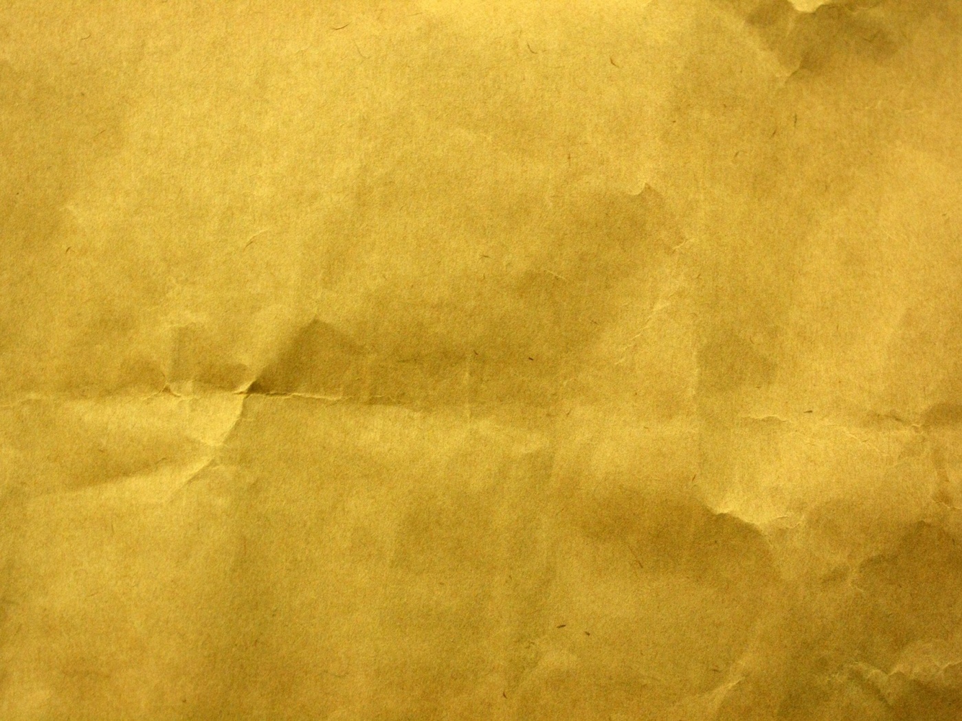 Текстура мятой желтой бумаги обои