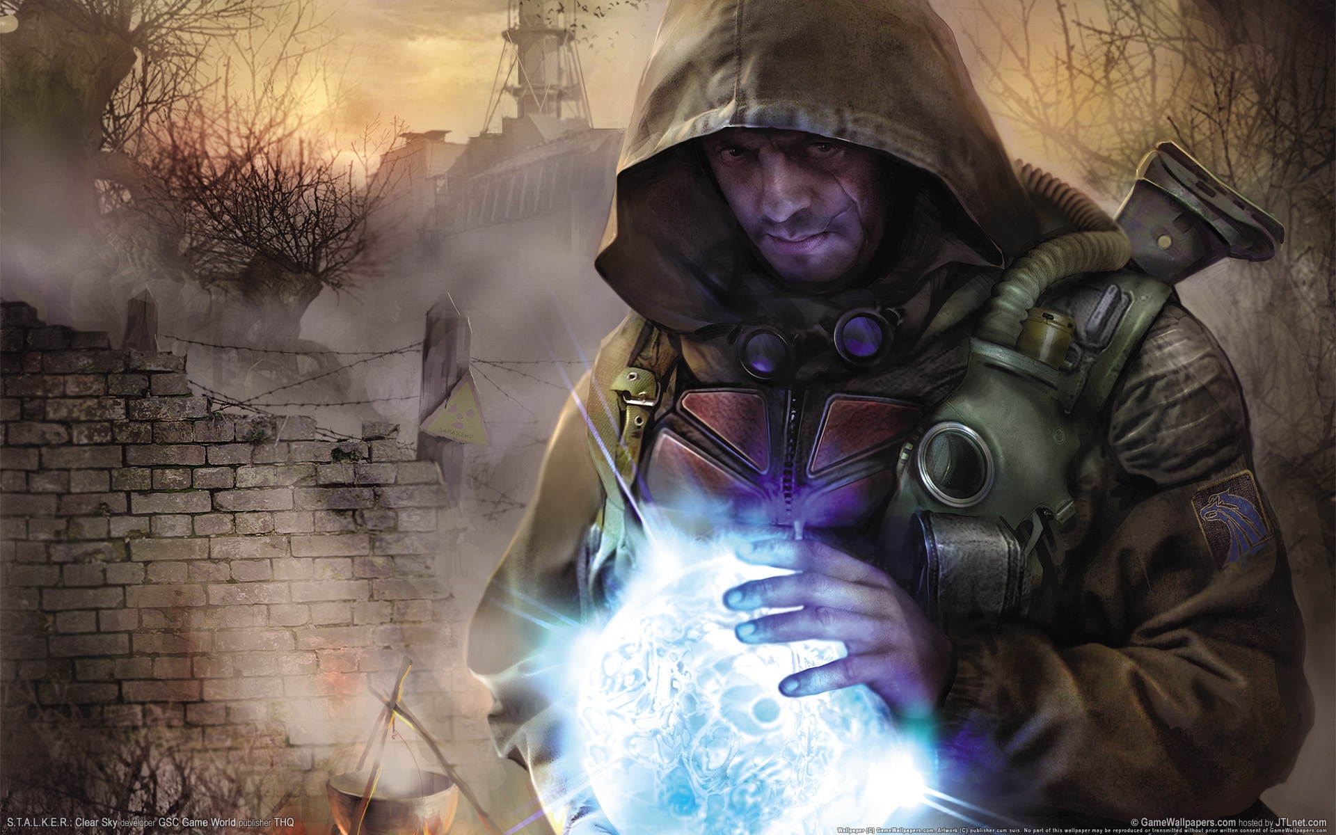 Сталкер с энергетическим артефактом в руках обои