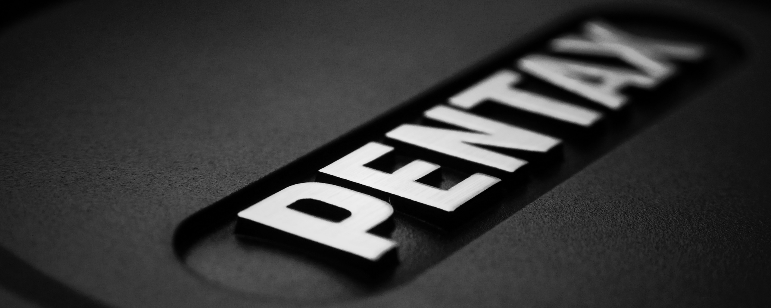 Фотоаппарат пентакс лого обои