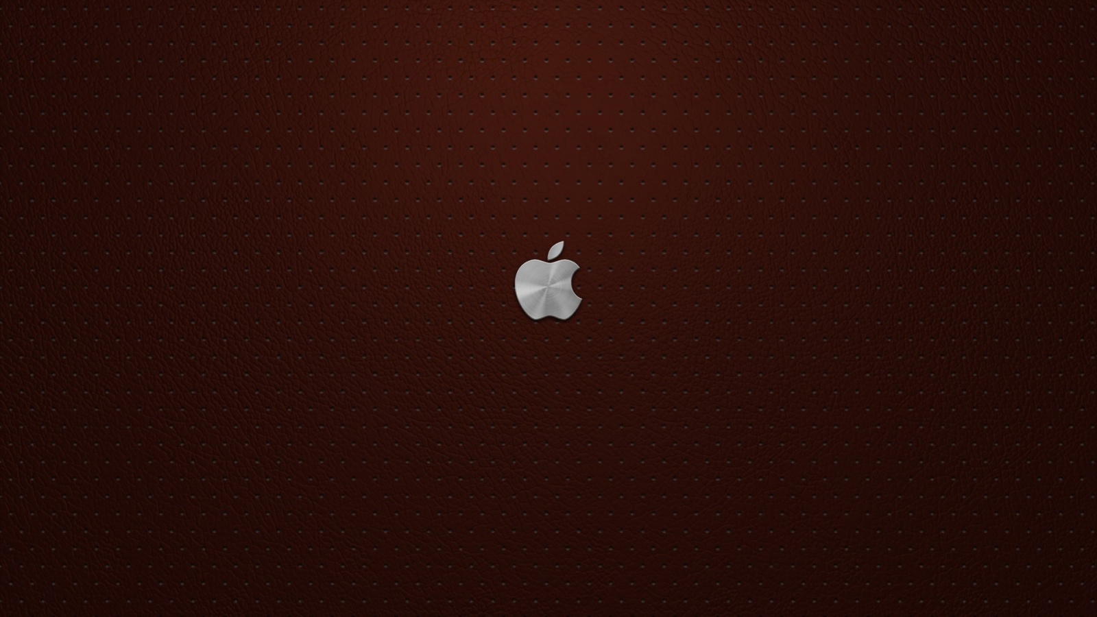 Маленький логотип Apple на перфорированной коже обои